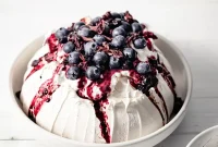 Crisp Meringue Berry Pavlova with Fresh Fruit and Cream