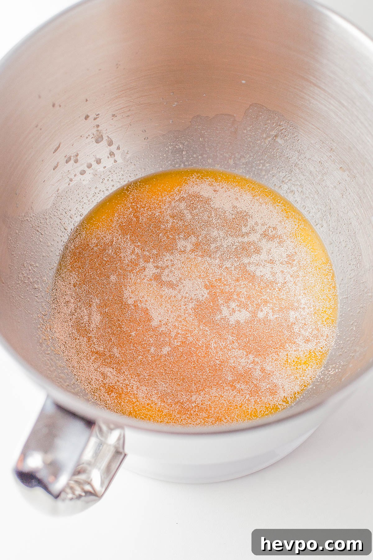 Yeast activating in the bowl of a stand mixer. 