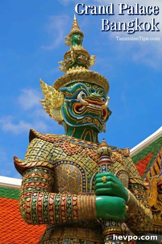 Grand Palace Bangkok over green figue with a staff