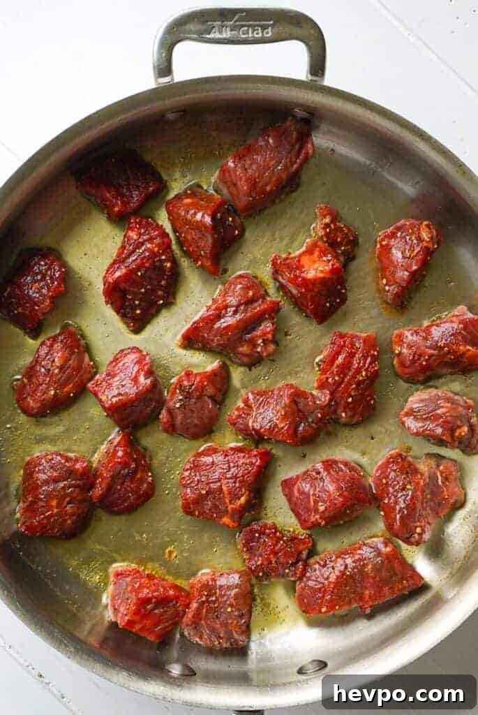 Garlic and Herb Steak Bites: Quick Savory Skillet Recipe 4 A frying pan full of Steak Bites.