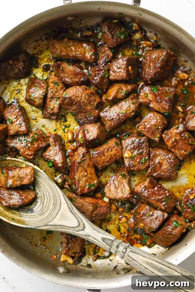 Garlic and Herb Steak Bites: Quick Savory Skillet Recipe 6 A frying pan full of Garlic Herb Steak Bites.