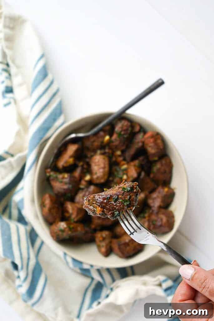 Garlic and Herb Steak Bites: Quick Savory Skillet Recipe 7 A bite of Garlic Herb Steak Bites.