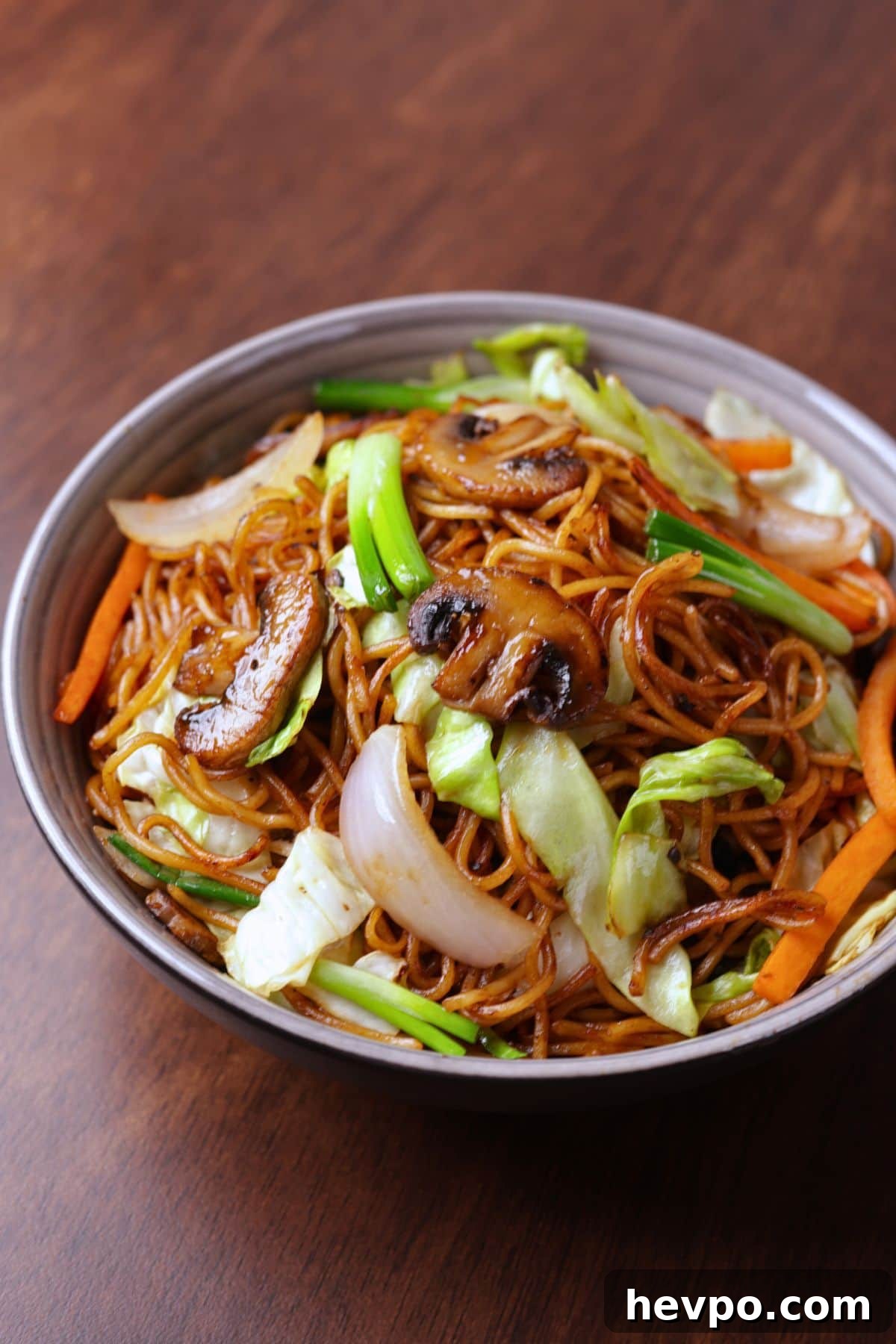 Vegetable Chow Mein: Simple Stir-Fry Noodles with Veggies 7 Vegetable chow mein served n a bowl.