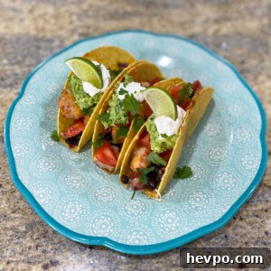 Crispy Baked Chicken Tacos with Cheesy Mexican Filling 2 Baked Chicken Tacos