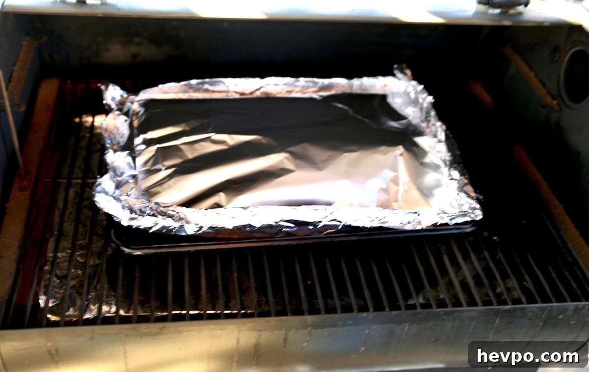 Foil packet on a pellet grill.