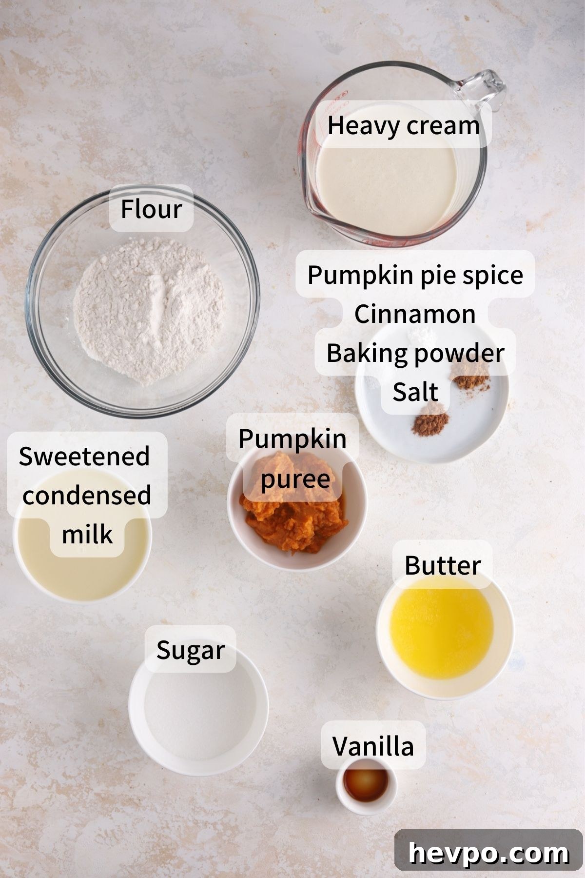 Creamy Pumpkin Ice Cream Recipe for Fall Desserts 3 Labeled ingredients needed to make pumpkin pie ice cream laid out on a table.