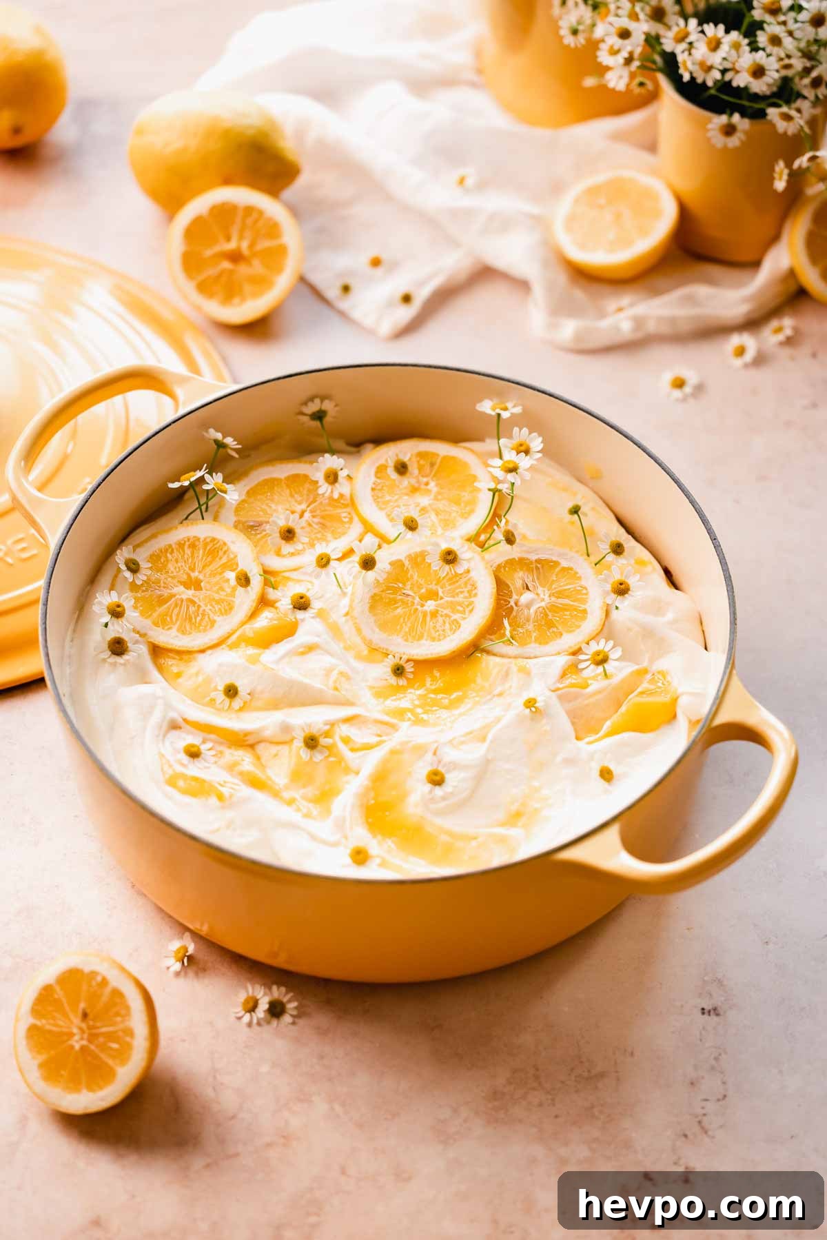 Moist Lemon Poke Cake Recipe with Zesty Lemon Glaze 2 lemon poke cake inside a pot