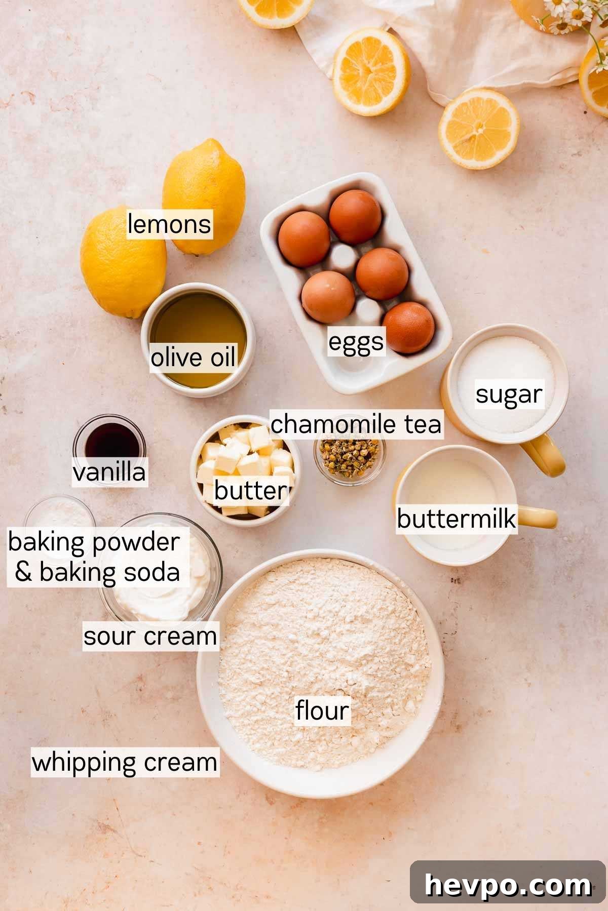 Moist Lemon Poke Cake Recipe with Zesty Lemon Glaze 4 lemon poke cake ingredients sitting on the cable in small bowls