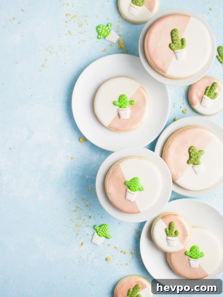 cacti cookies on plates along the right hand side of the photo