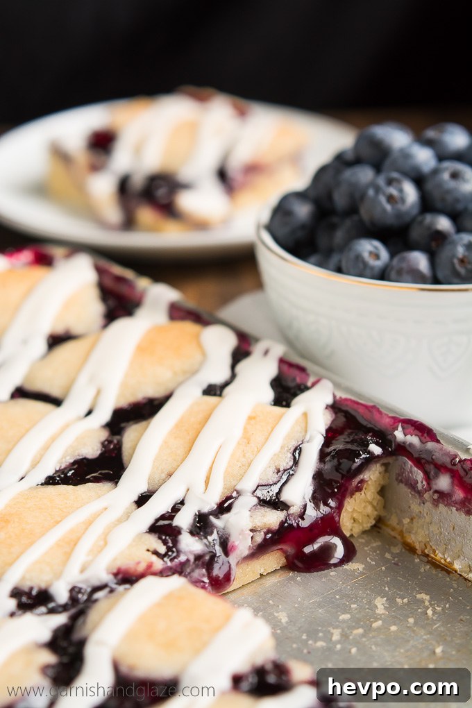 Craving pie but not all the work that comes with it? Make these easy Blueberry Pie Bars that no one will be able to resist.