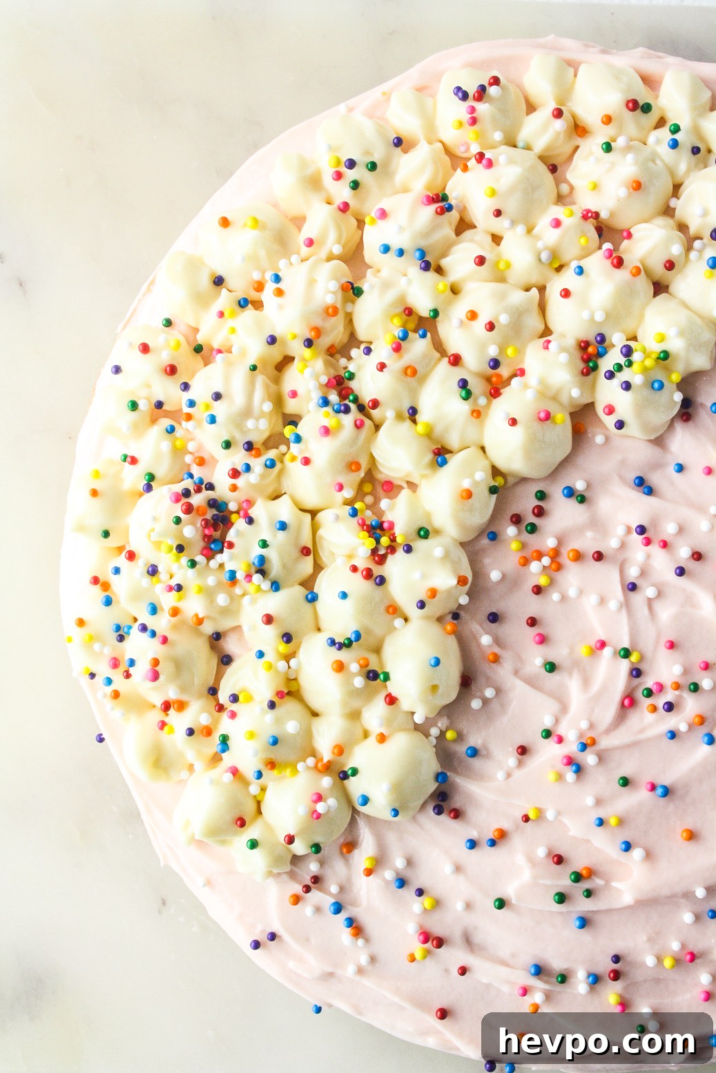Funfetti Birthday Cake with Cream Cheese Frosting 3 Buttery layer cake with sprinkles and pink frosting!