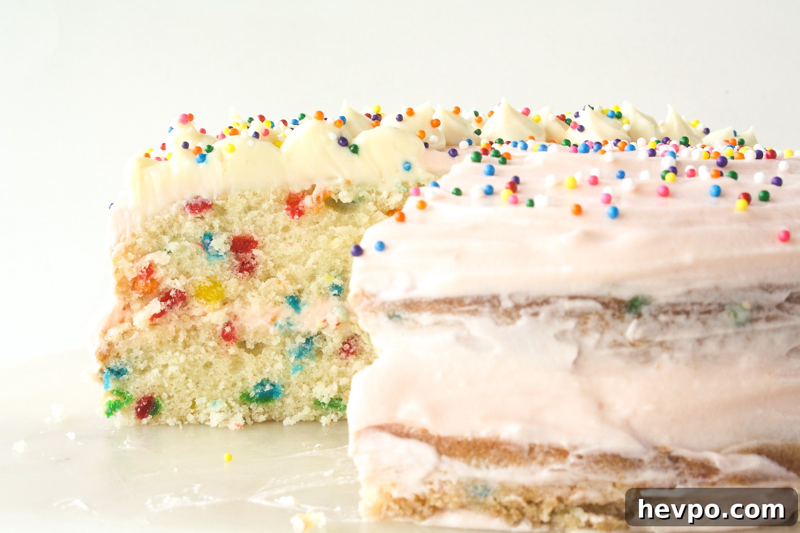 Funfetti Birthday Cake with Cream Cheese Frosting 6 Buttery layer cake with sprinkles and pink frosting!