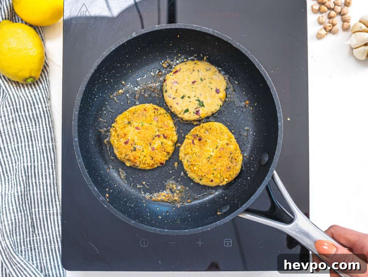 Step 3 Pan frying chickpea patties in olive oil until crispy and golden brown.