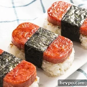 How to Make Spam Musubi: Simple Hawaiian Rice and Nori Snack 10 Spam musubi, rice and spam wrapped with nori seaweed.