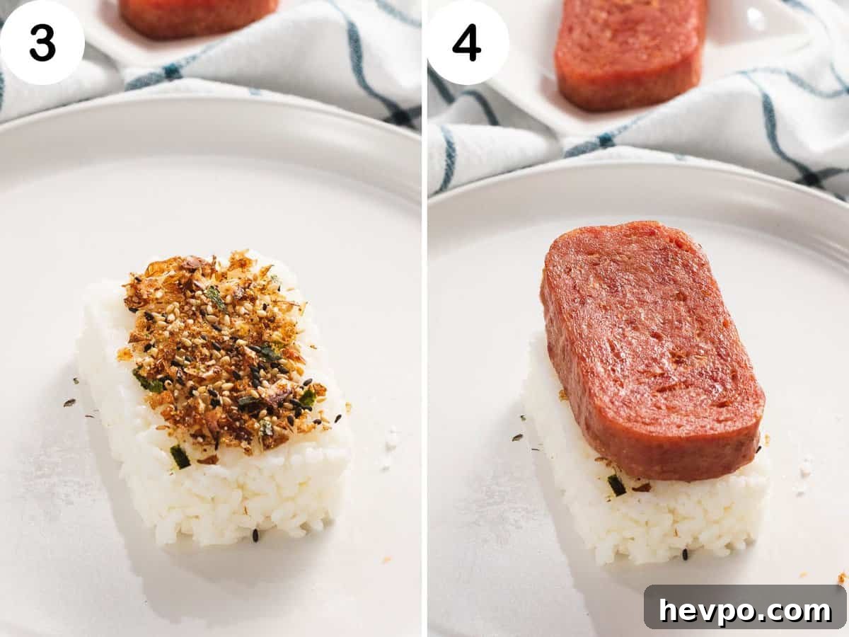 How to Make Spam Musubi: Simple Hawaiian Rice and Nori Snack 6 Rice topped with furikake and a slice of spam.