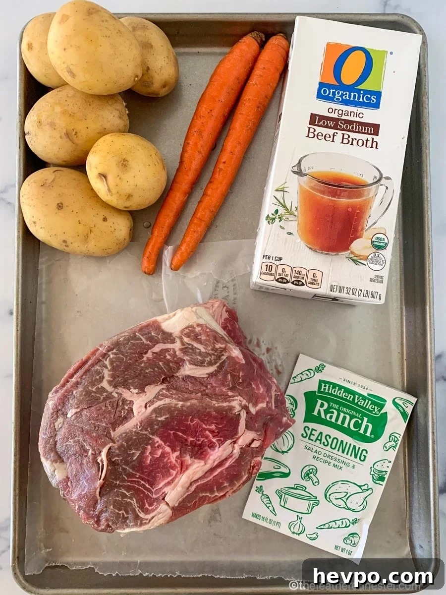 Slow-Cooked Crockpot Chuck Roast Recipe for Tender Beef 4 Ingredients for Crock Pot Chuck Roast: ranch seasoning mix, a chuck roast, beef beef broth, potatoes, and carrots