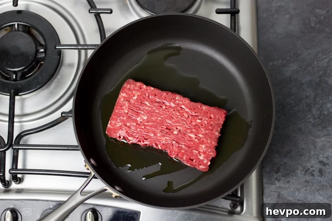 olive oil and beef mince in a large saucepan (easy spaghetti bolognese)