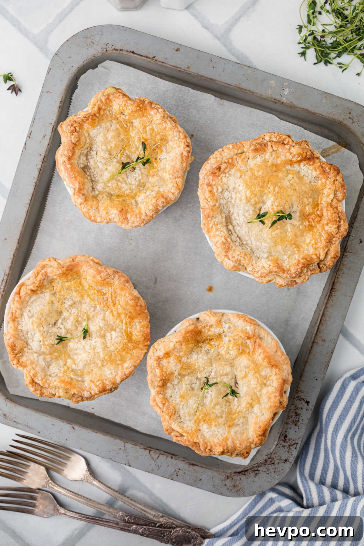 Overhead picture of four mini chicken pot pies.