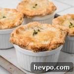 A square image of mini chicken pot pies.