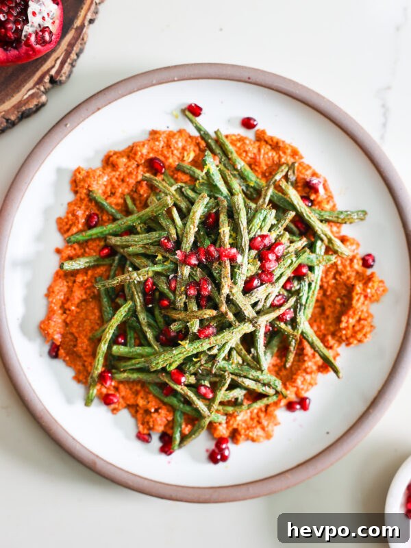 Crispy Air Fryer Sweet Potato Wedges Recipe 10 Air fryer green beasn and muhammara on a plate.