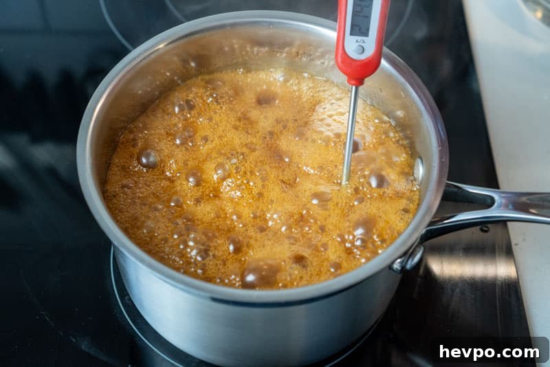 Checking the temperature of the caramel