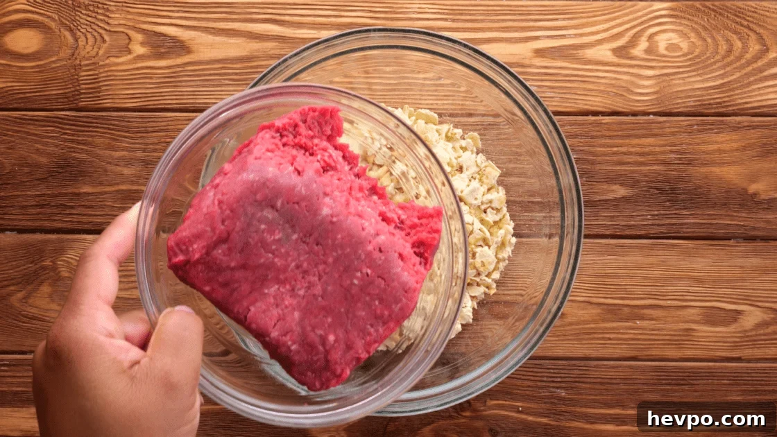 Add ground beef to mixing bowl.