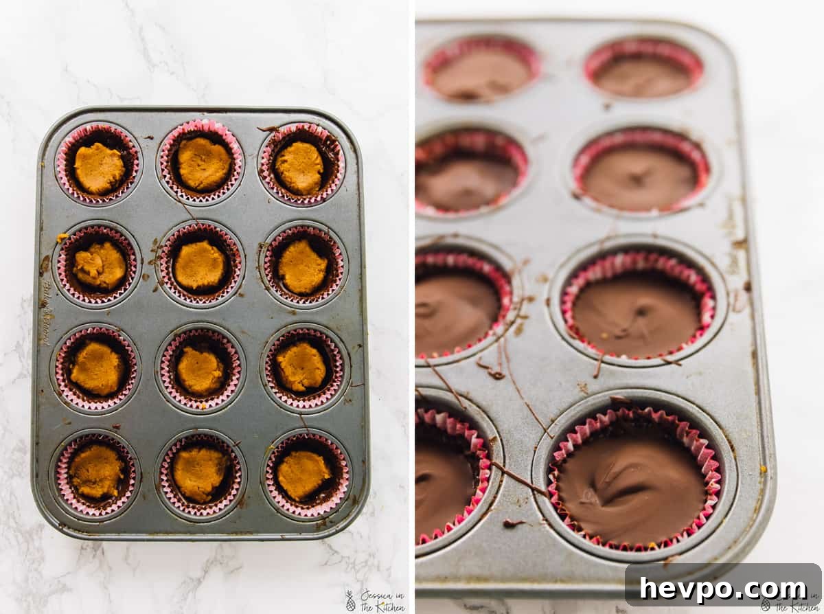 Pumpkin chocolate cups in a muffin tray.