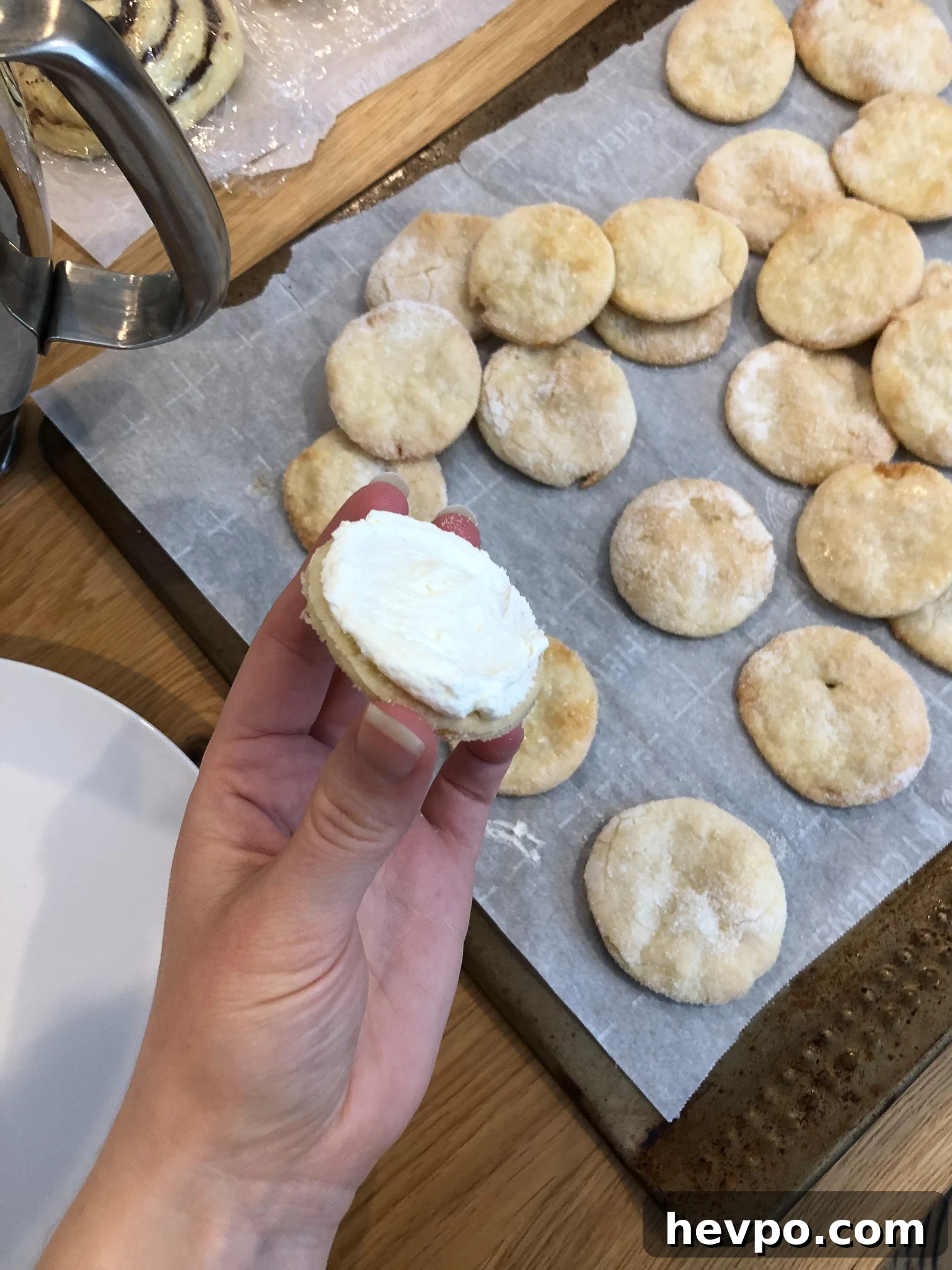 French Waffle Cookies Recipe — Crisp, Buttery Homemade Wafers 13 Buttercream on one cookie half.