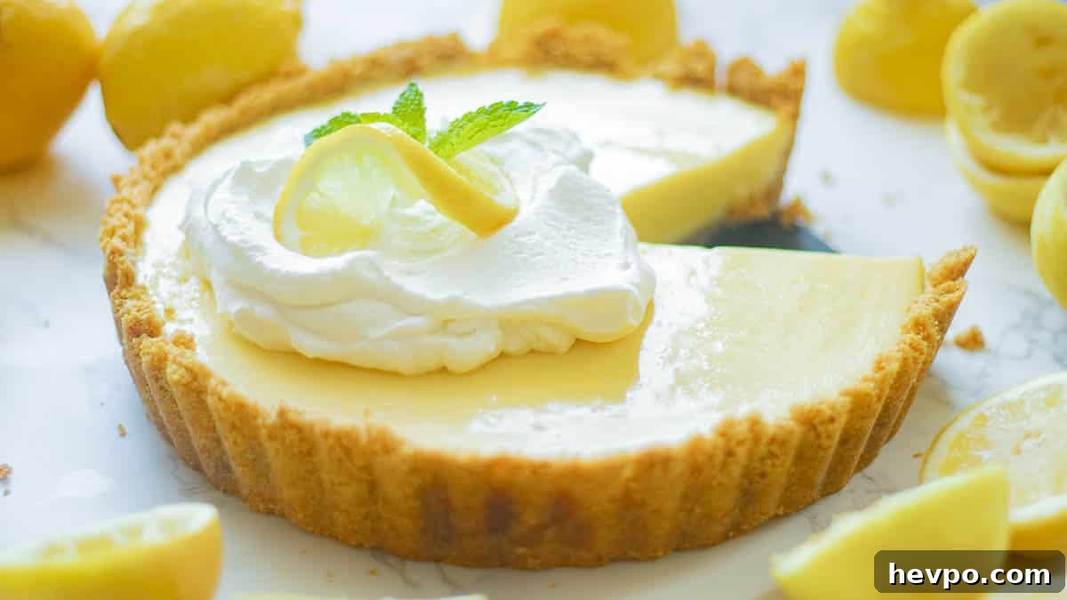 lemon icebox pie with slices cut out