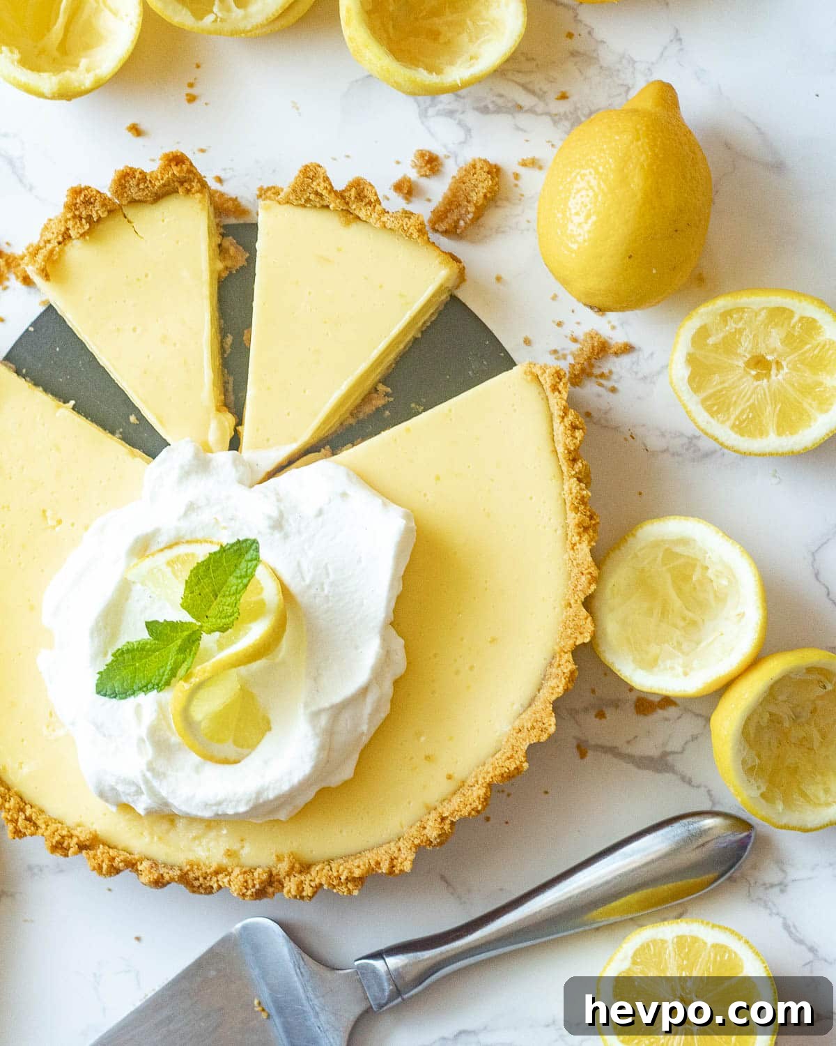lemon icebox pie with slices cut out