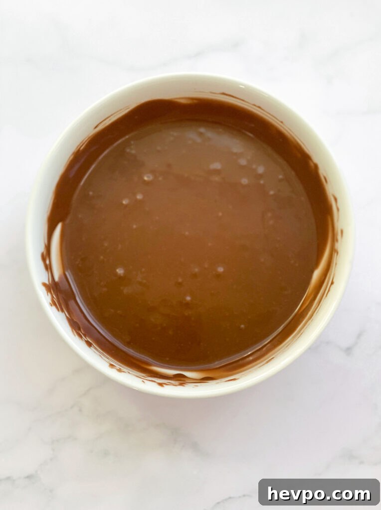 Baked Chocolate Peppermint Donuts Recipe for the Holidays 14 glaze in a bowl