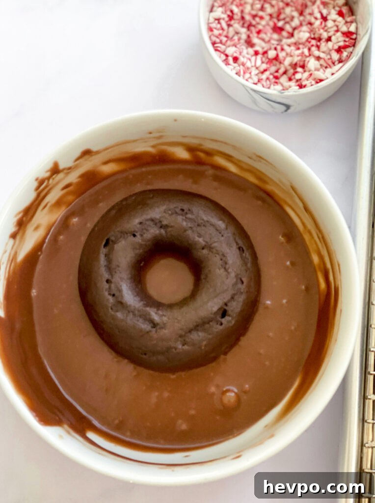 Baked Chocolate Peppermint Donuts Recipe for the Holidays 15 baked chocolate peppermint donut dipped into glaze