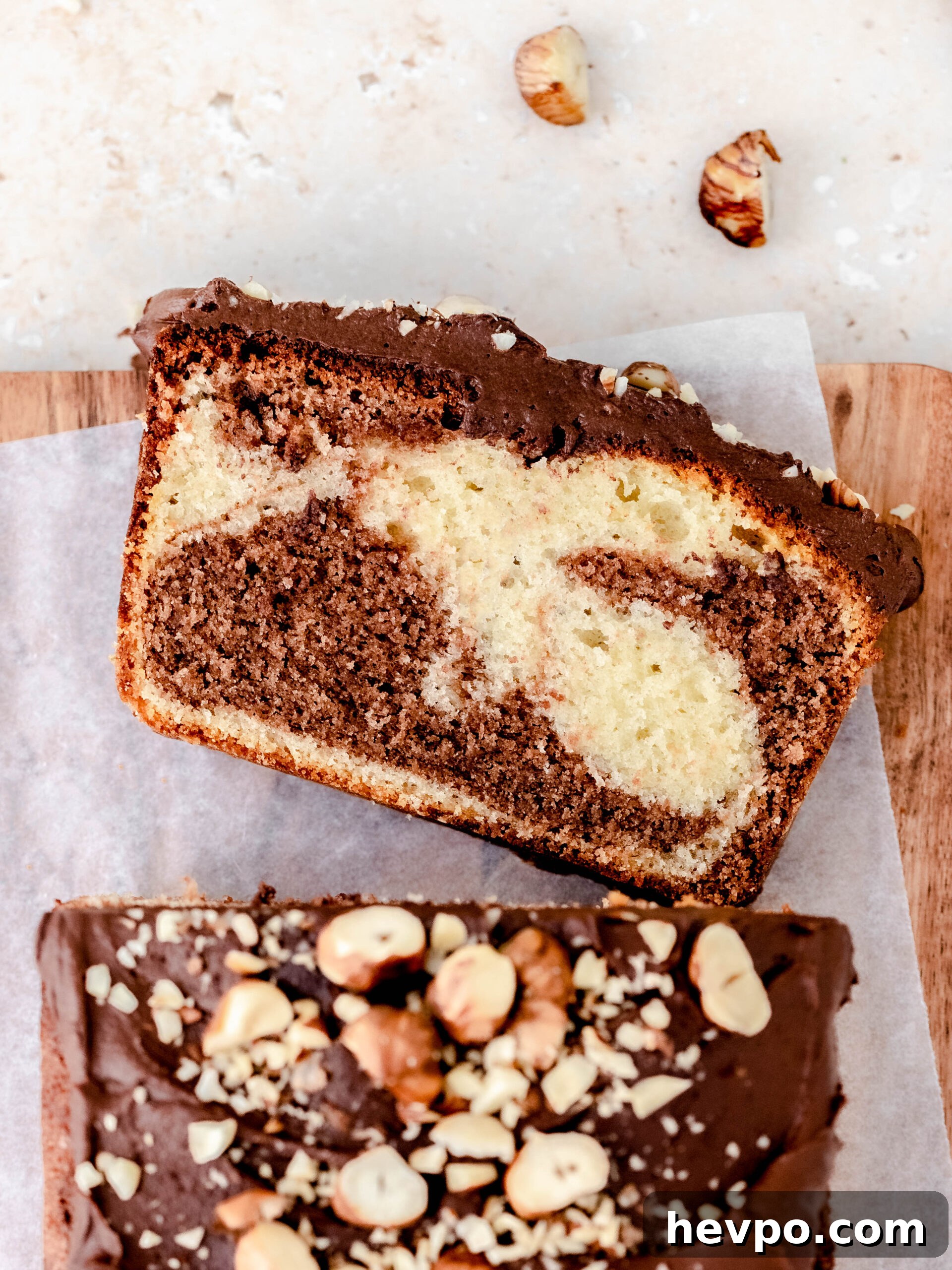 Decadent Nutella Swirl Loaf Cake Recipe for Chocolate Lovers 4 A slice of Nutella loaf cake on a tray.