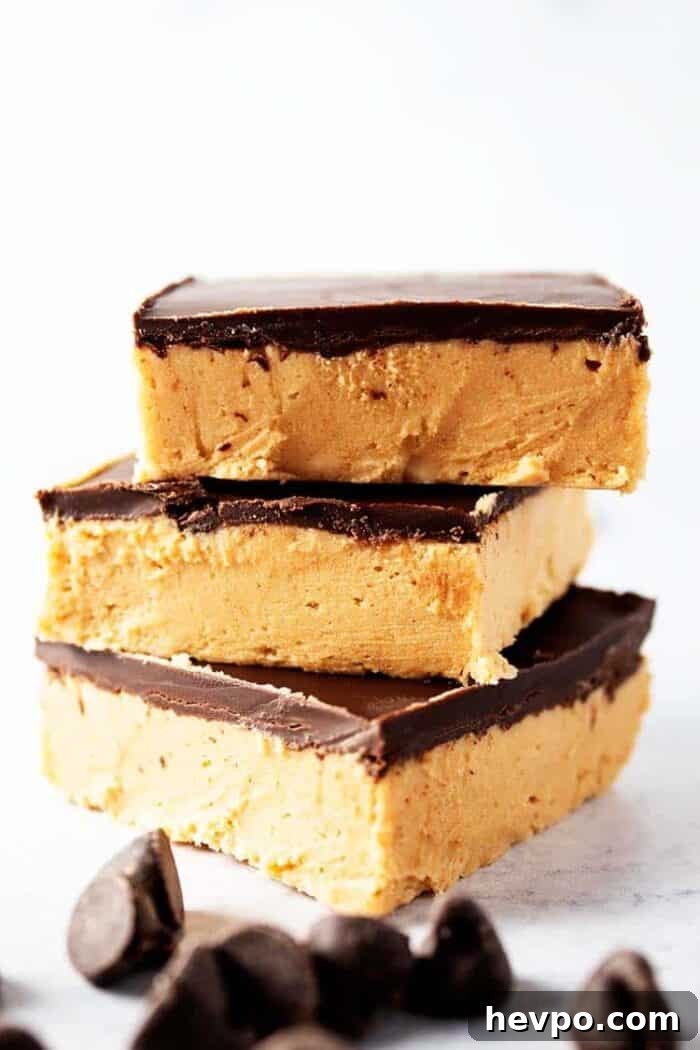 three pieces of keto no bake peanut butter bars
