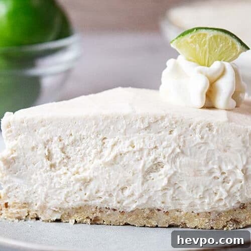 sideview of slice of keto no bake key lime cheesecake