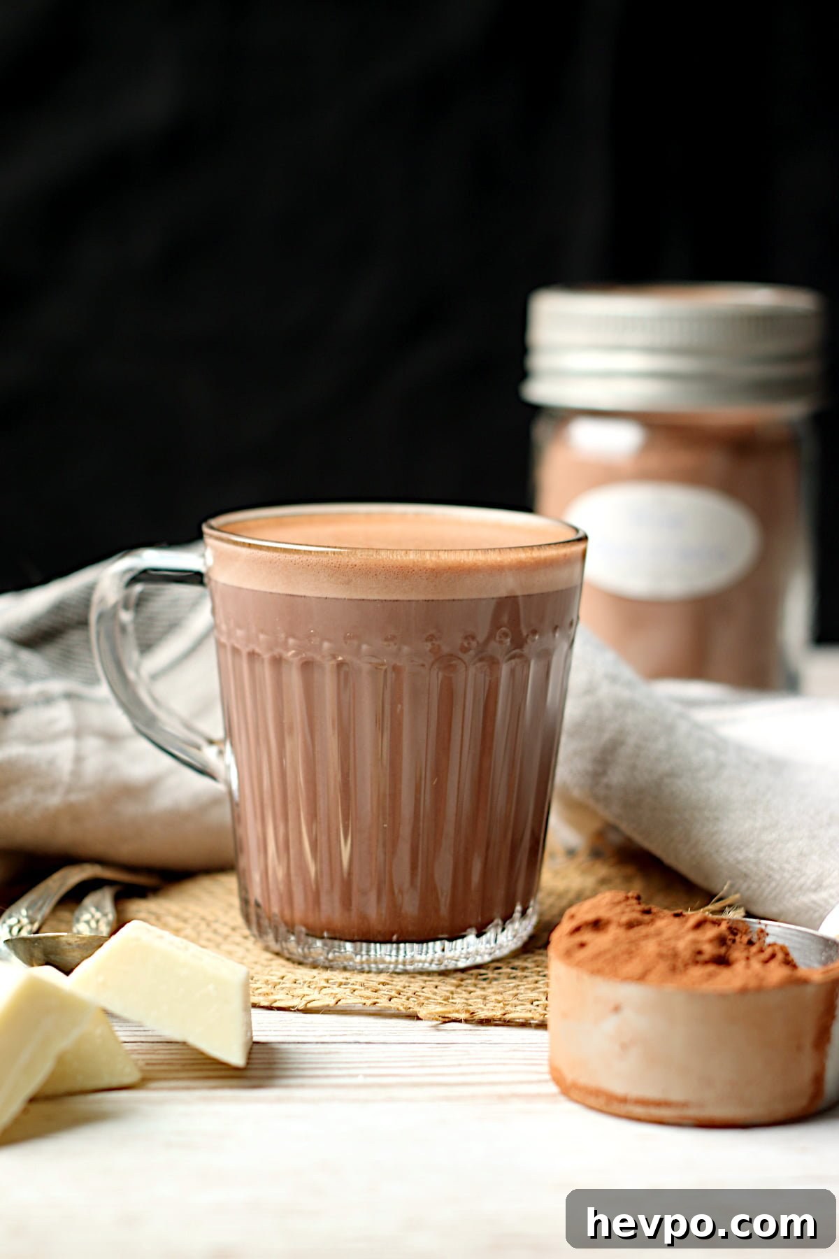 Homemade Hot Chocolate in a clear glass mug.