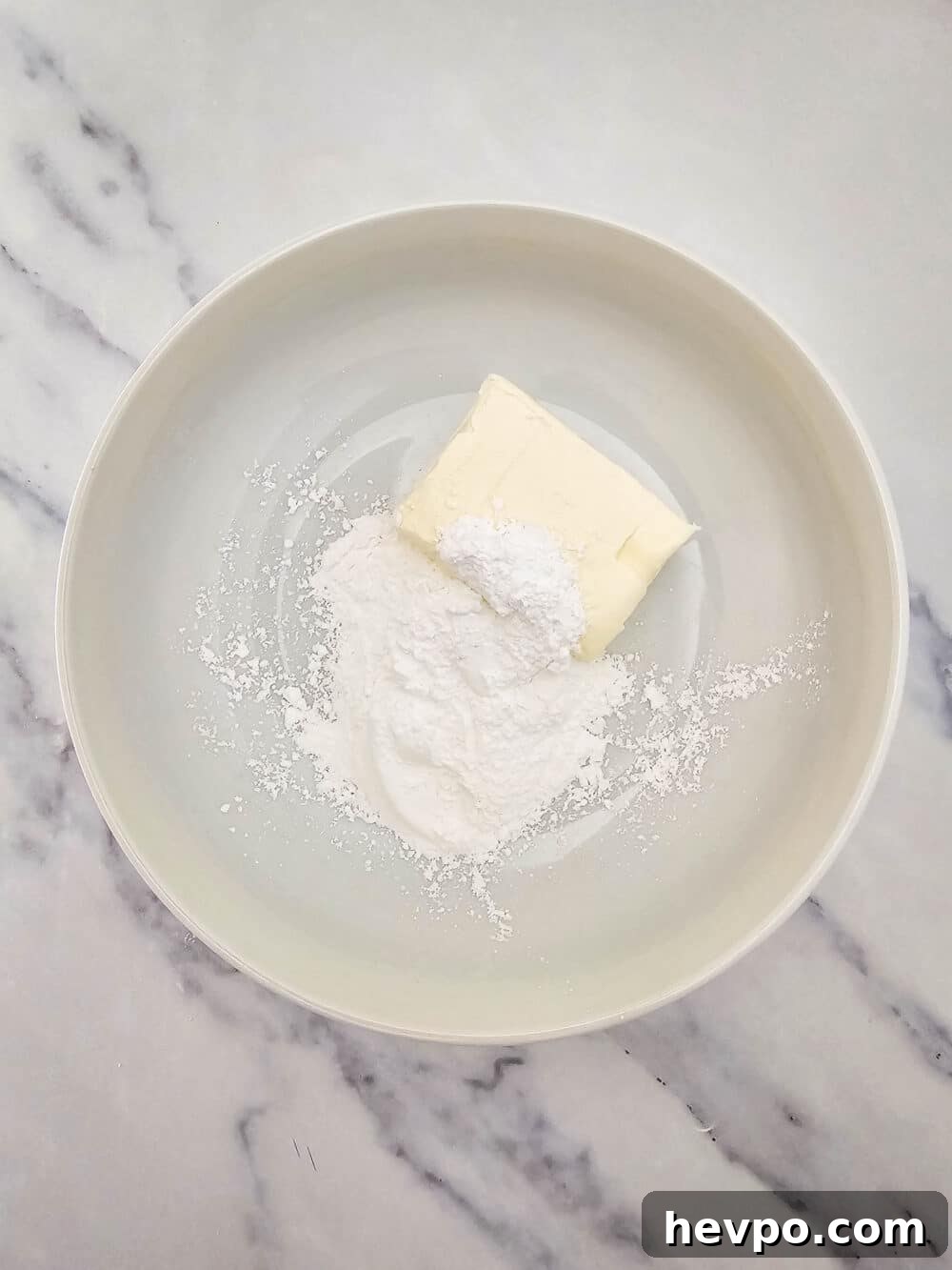 cream cheese and sweetener in a bowl