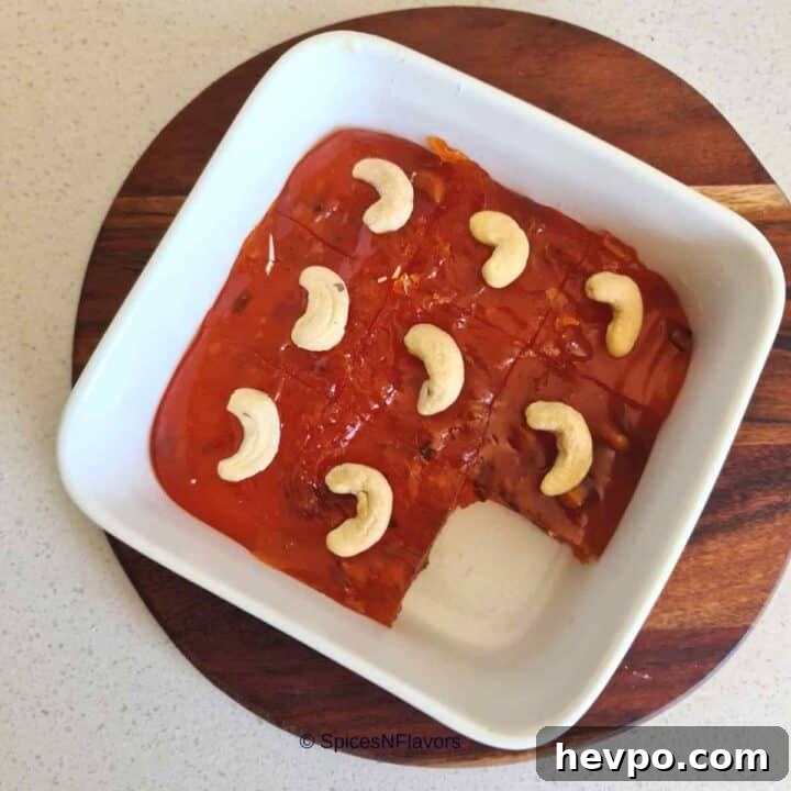 karachi halwa sliced into 9 equal pieces in the pan itsel