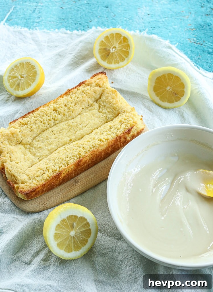 Keto Gluten-Free Sugar-Free Lemon Loaf Cake Recipe 10 the glaze in a bowl ready to be spread on the lemon loaf cake