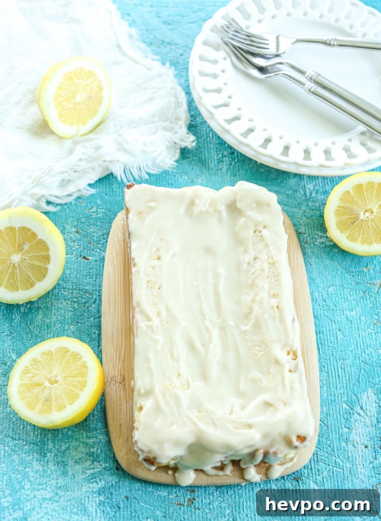 Keto Gluten-Free Sugar-Free Lemon Loaf Cake Recipe 12 overhead shot of cake with glaze