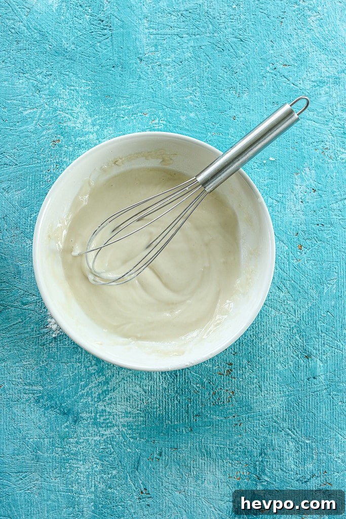 Keto Gluten-Free Sugar-Free Lemon Loaf Cake Recipe 8 lemon glaze ingredients mixed together