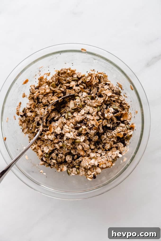 Homemade Muesli Bars Recipe for Energy and Crunch 6 muesli bar ingredients in a mixing bowl