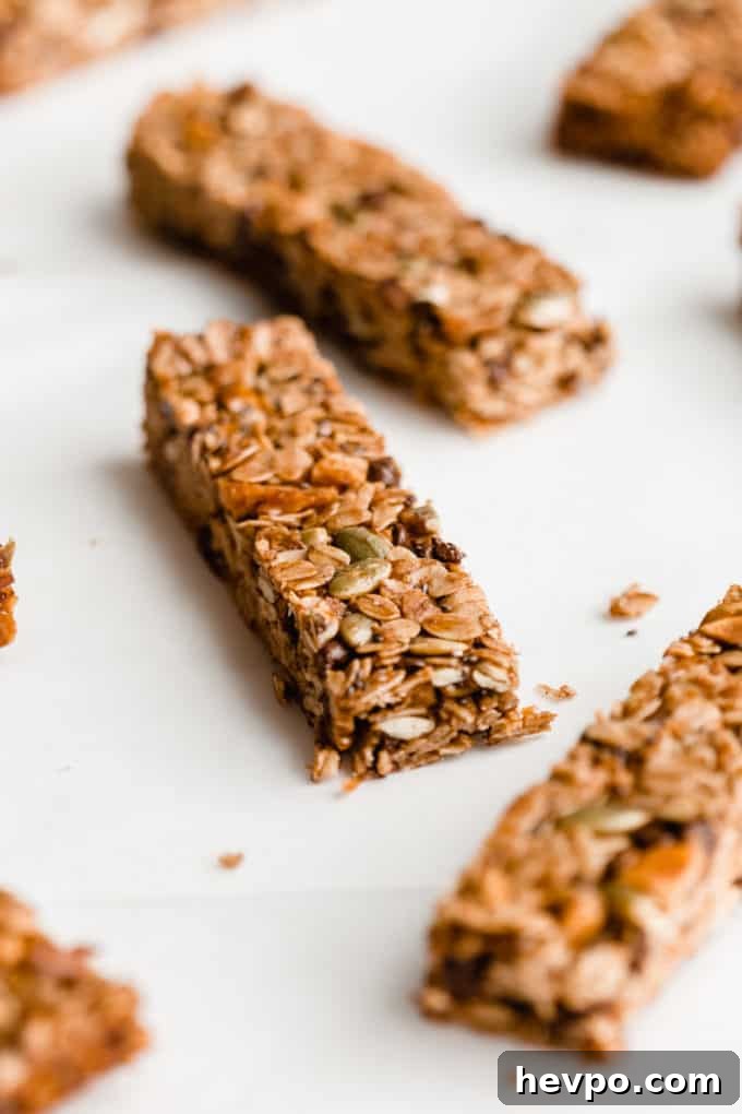 Homemade Muesli Bars Recipe for Energy and Crunch 10 cut up muesli bars on parchment paper