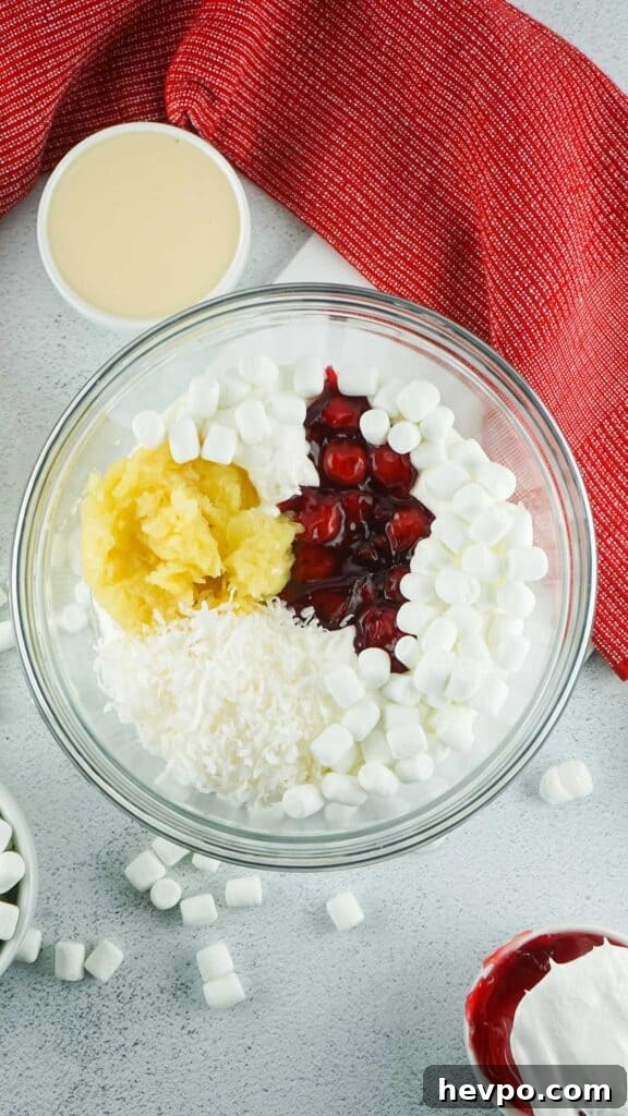 Light and Creamy Cherry Fluff Dessert Recipe 4 cherry fluff ingredients in glass bowl