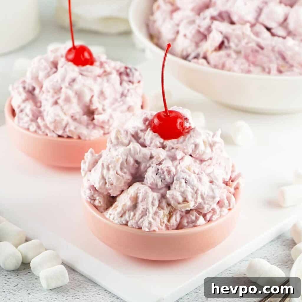 Light and Creamy Cherry Fluff Dessert Recipe 6 two bowls of cherry fluff topped with cherries