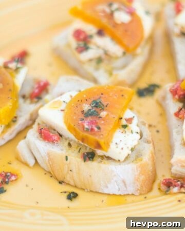 Roasted Golden Beet Marinated Mozzarella Herb Crostini
