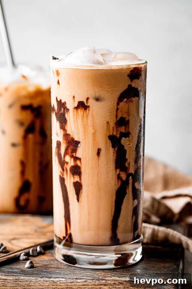 side shot of drinking glasses filled with iced coffee
