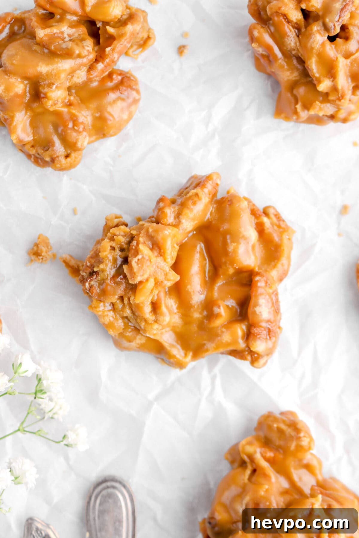 Southern Buttermilk Pecan Pralines Recipe – Classic Southern Candy 3 overhead close up of pralines on parchment paper