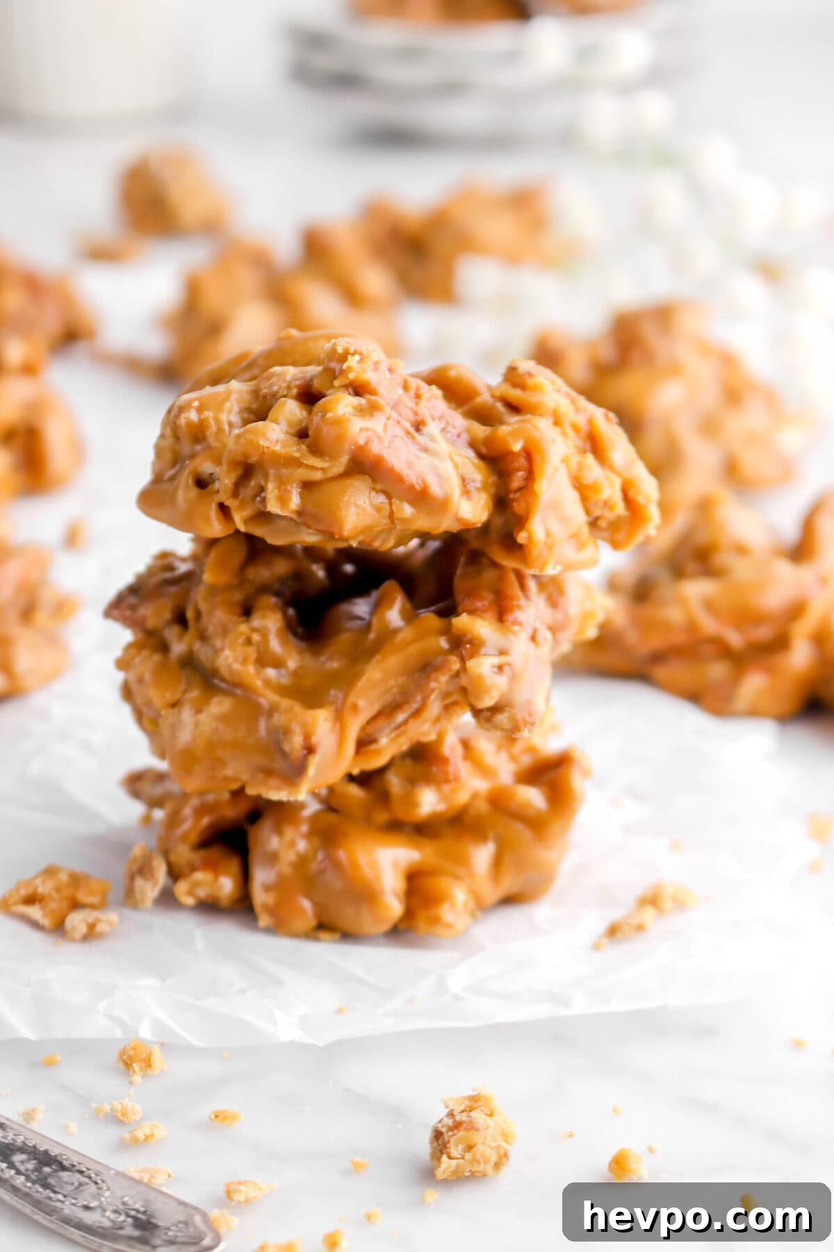 Southern Buttermilk Pecan Pralines Recipe – Classic Southern Candy 4 close up of three stacked parchment paper