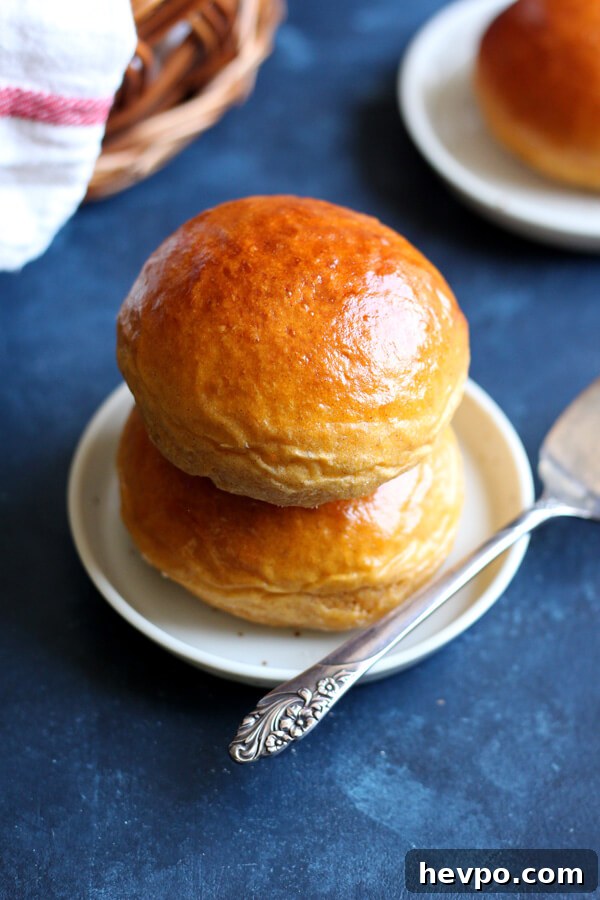 Soft and Fluffy Sweet Potato Dinner Rolls for Holiday Tables 4 These Sweet Potato Dinner Rolls are light and fluffy with a hint of warm cinnamon. They will make a wonderful addition to your holiday menu this season. | wildwildwhisk.com